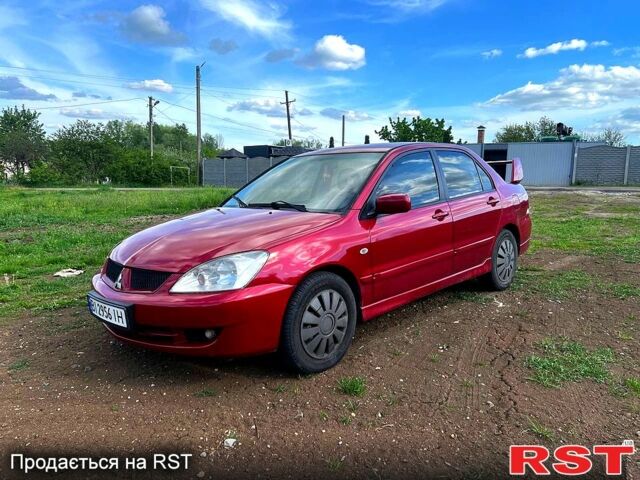 Червоний Міцубісі Lancer, об'ємом двигуна 1.6 л та пробігом 217 тис. км за 3800 $, фото 1 на Automoto.ua