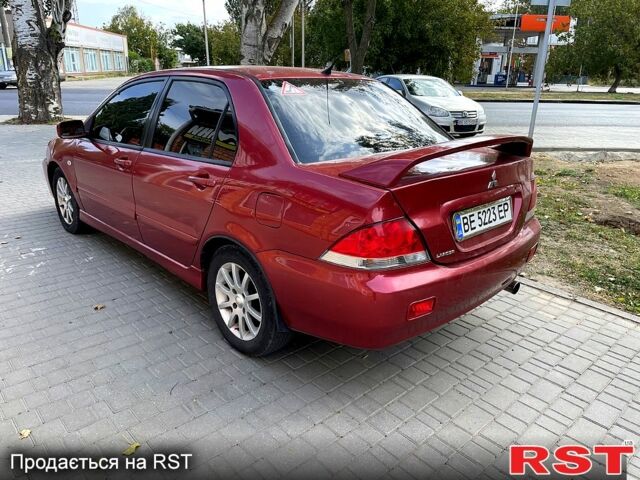 Червоний Міцубісі Lancer, об'ємом двигуна 1.6 л та пробігом 290 тис. км за 4250 $, фото 1 на Automoto.ua