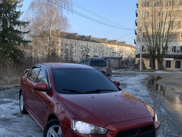 Червоний Міцубісі Lancer, об'ємом двигуна 2 л та пробігом 320 тис. км за 6300 $, фото 1 на Automoto.ua
