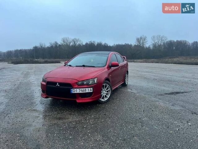 Красный Мицубиси Лансер, объемом двигателя 1.5 л и пробегом 241 тыс. км за 5850 $, фото 1 на Automoto.ua