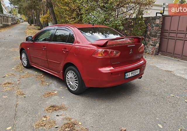 Червоний Міцубісі Lancer, об'ємом двигуна 2 л та пробігом 187 тис. км за 5500 $, фото 1 на Automoto.ua