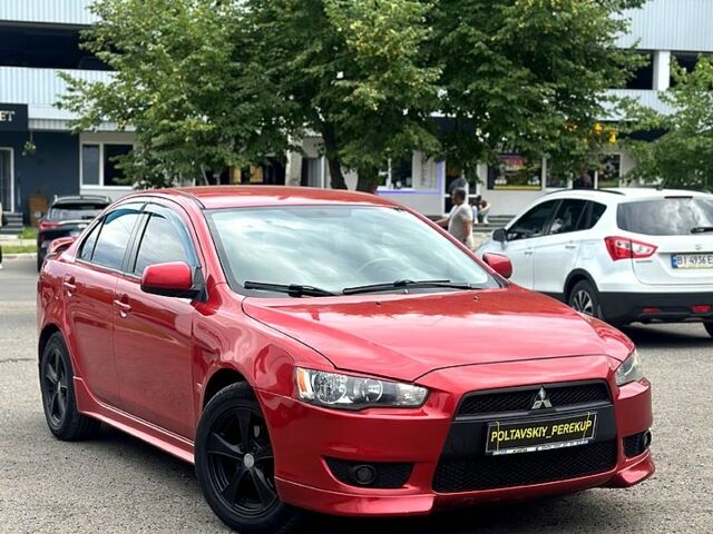 Червоний Міцубісі Lancer, об'ємом двигуна 2 л та пробігом 184 тис. км за 5999 $, фото 1 на Automoto.ua