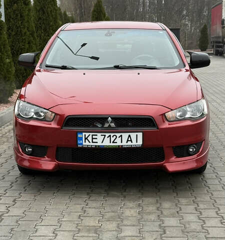 Красный Мицубиси Лансер, объемом двигателя 2 л и пробегом 261 тыс. км за 7200 $, фото 1 на Automoto.ua