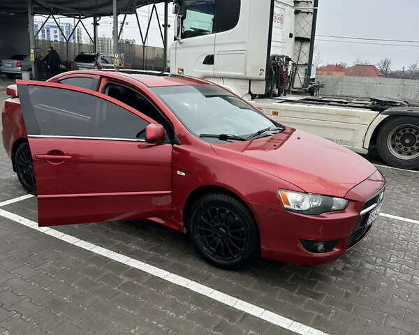 Червоний Міцубісі Lancer, об'ємом двигуна 2 л та пробігом 258 тис. км за 5800 $, фото 1 на Automoto.ua