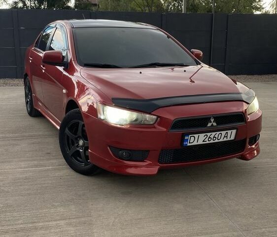 Червоний Міцубісі Lancer, об'ємом двигуна 1.5 л та пробігом 157 тис. км за 5498 $, фото 1 на Automoto.ua