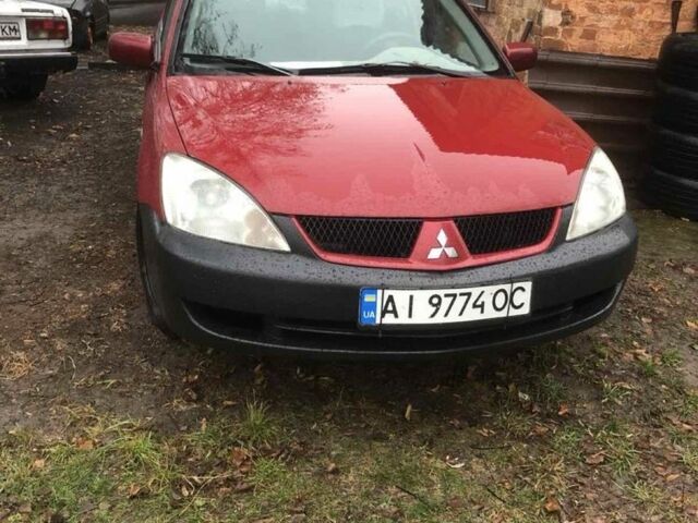 Червоний Міцубісі Lancer, об'ємом двигуна 1.6 л та пробігом 286 тис. км за 3450 $, фото 1 на Automoto.ua