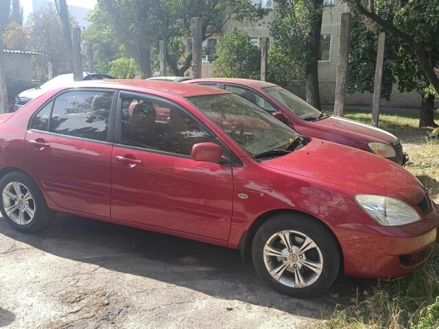 Красный Мицубиси Лансер, объемом двигателя 0 л и пробегом 221 тыс. км за 5500 $, фото 1 на Automoto.ua