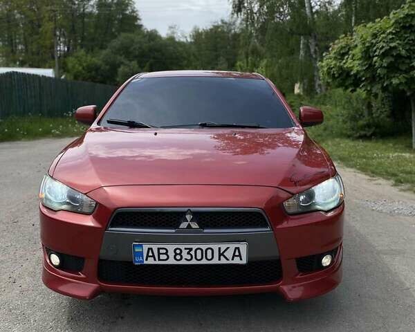 Червоний Міцубісі Lancer, об'ємом двигуна 2 л та пробігом 200 тис. км за 6300 $, фото 1 на Automoto.ua