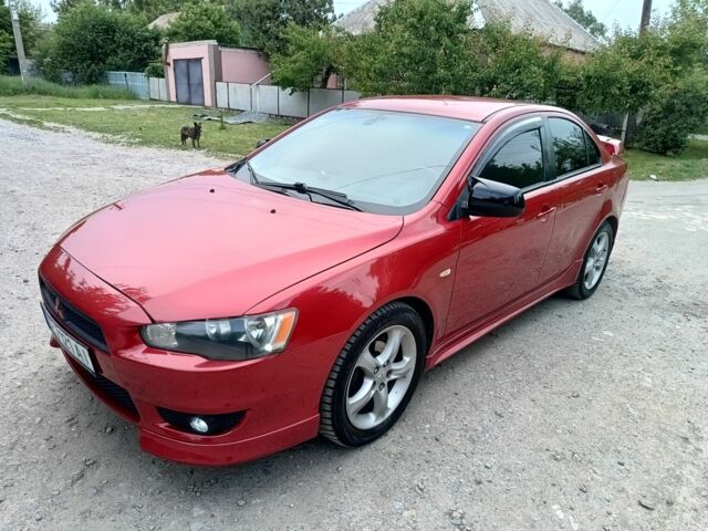 Червоний Міцубісі Lancer, об'ємом двигуна 2 л та пробігом 259 тис. км за 6500 $, фото 1 на Automoto.ua