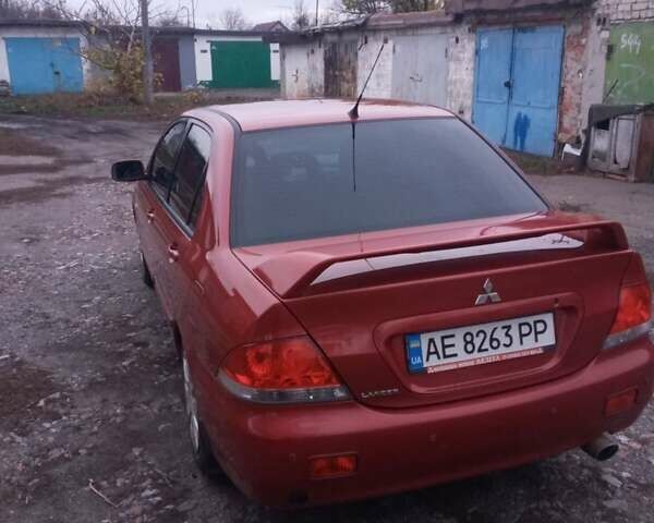 Червоний Міцубісі Lancer, об'ємом двигуна 0 л та пробігом 241 тис. км за 5200 $, фото 1 на Automoto.ua