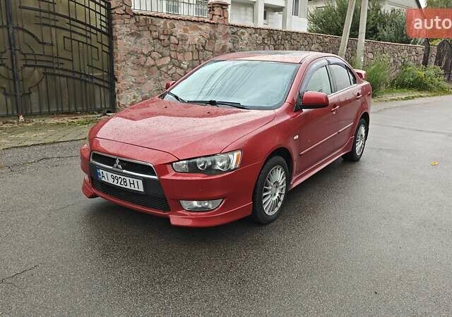 Червоний Міцубісі Lancer, об'ємом двигуна 2 л та пробігом 186 тис. км за 5600 $, фото 1 на Automoto.ua