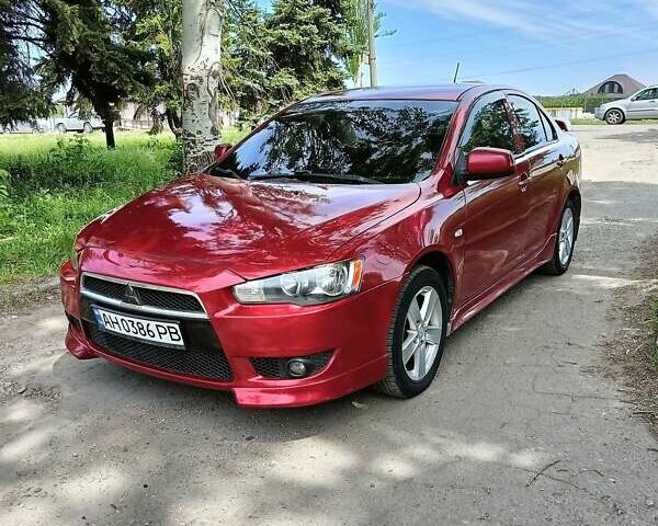 Червоний Міцубісі Lancer, об'ємом двигуна 2 л та пробігом 240 тис. км за 6300 $, фото 1 на Automoto.ua