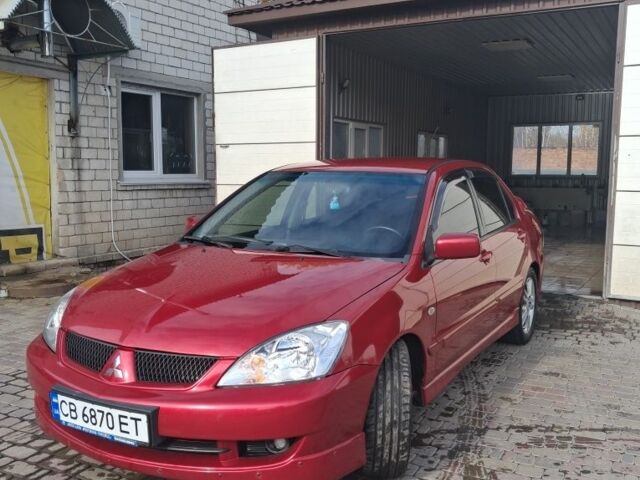 Мицубиси Лансер 2007 в Нежине на Automoto.ua Красный Мицубиси Лансер, объемом двигателя 2 л и пробегом 200 тыс. км за 5500 $, фото 1 на Automoto.ua