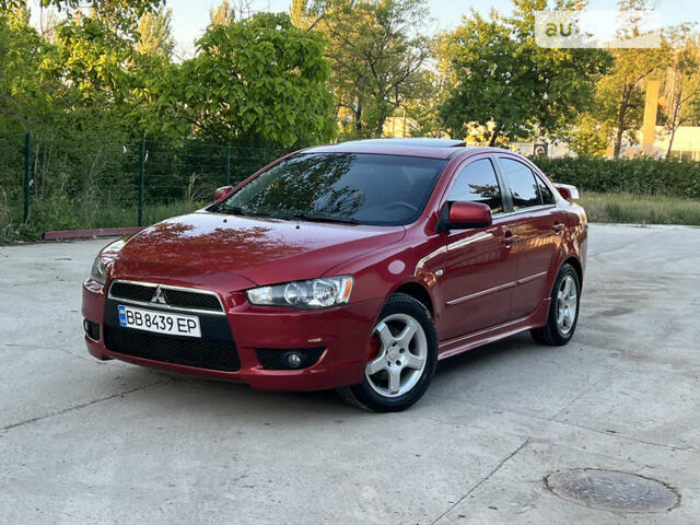 Червоний Міцубісі Lancer, об'ємом двигуна 2 л та пробігом 250 тис. км за 6500 $, фото 1 на Automoto.ua