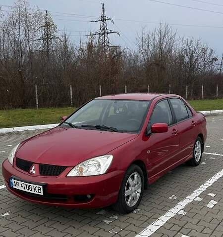 Красный Мицубиси Лансер, объемом двигателя 1.6 л и пробегом 176 тыс. км за 4300 $, фото 1 на Automoto.ua