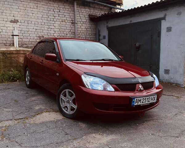 Червоний Міцубісі Lancer, об'ємом двигуна 1.58 л та пробігом 151 тис. км за 5600 $, фото 1 на Automoto.ua
