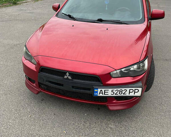 Червоний Міцубісі Lancer, об'ємом двигуна 2 л та пробігом 175 тис. км за 7000 $, фото 1 на Automoto.ua