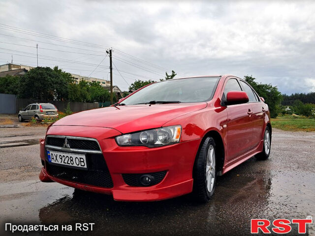 Червоний Міцубісі Lancer, об'ємом двигуна 2 л та пробігом 187 тис. км за 5000 $, фото 1 на Automoto.ua