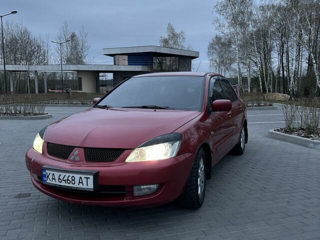 Червоний Міцубісі Lancer, об'ємом двигуна 1.6 л та пробігом 268 тис. км за 4800 $, фото 1 на Automoto.ua