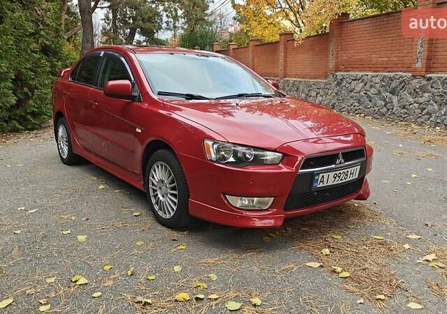 Міцубісі Lancer 2007 у Києві на Automoto.ua Червоний Міцубісі Lancer, об'ємом двигуна 2 л та пробігом 186 тис. км за 5600 $, фото 1 на Automoto.ua