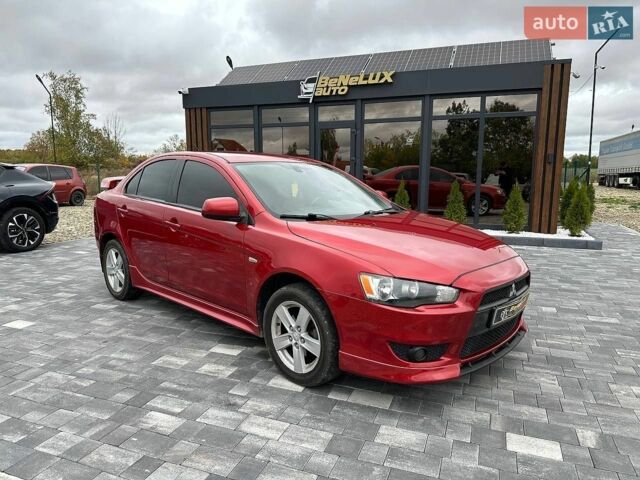 Червоний Міцубісі Lancer, об'ємом двигуна 2 л та пробігом 293 тис. км за 6399 $, фото 1 на Automoto.ua