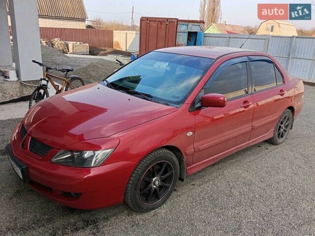 Червоний Міцубісі Lancer, об'ємом двигуна 1.58 л та пробігом 300 тис. км за 5300 $, фото 1 на Automoto.ua