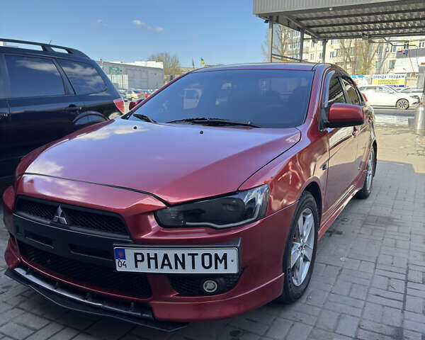 Червоний Міцубісі Lancer, об'ємом двигуна 2 л та пробігом 254 тис. км за 7500 $, фото 1 на Automoto.ua