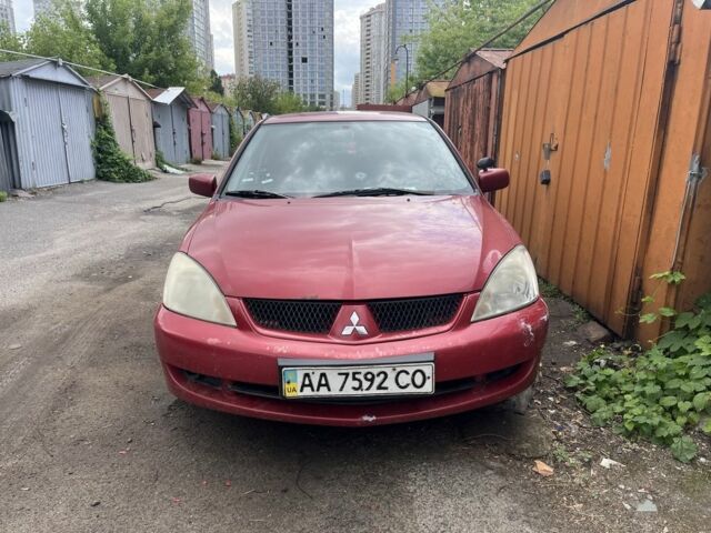 Красный Мицубиси Лансер, объемом двигателя 1.6 л и пробегом 3 тыс. км за 3000 $, фото 1 на Automoto.ua
