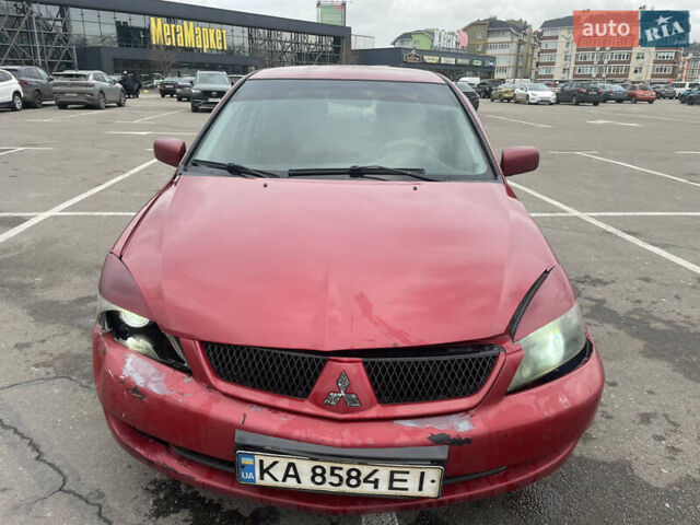 Червоний Міцубісі Lancer, об'ємом двигуна 1.58 л та пробігом 290 тис. км за 2650 $, фото 1 на Automoto.ua