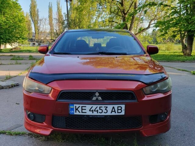 Красный Мицубиси Лансер, объемом двигателя 1.5 л и пробегом 157 тыс. км за 4900 $, фото 1 на Automoto.ua