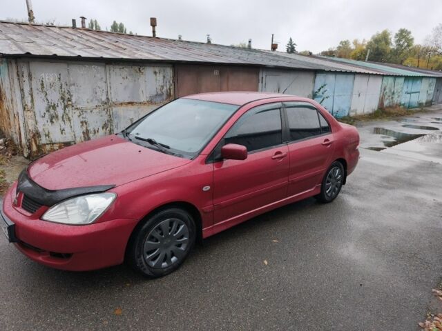 Червоний Міцубісі Lancer, об'ємом двигуна 1.6 л та пробігом 187 тис. км за 4554 $, фото 1 на Automoto.ua