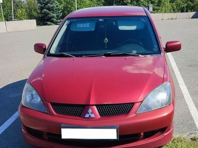 Червоний Міцубісі Lancer, об'ємом двигуна 2 л та пробігом 278 тис. км за 4000 $, фото 1 на Automoto.ua