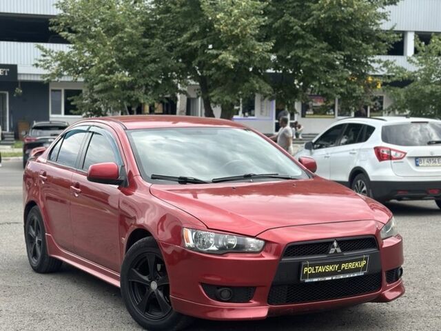 Червоний Міцубісі Lancer, об'ємом двигуна 2 л та пробігом 184 тис. км за 5999 $, фото 1 на Automoto.ua