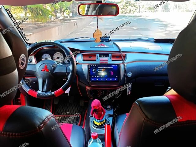 Красный Мицубиси Лансер, объемом двигателя 0 л и пробегом 252 тыс. км за 5400 $, фото 1 на Automoto.ua