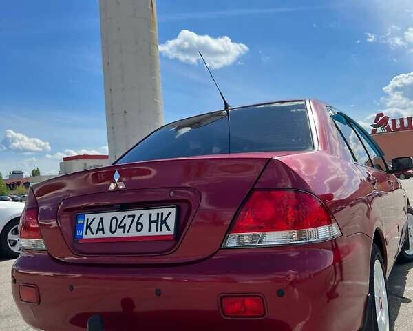 Червоний Міцубісі Lancer, об'ємом двигуна 1.58 л та пробігом 372 тис. км за 4700 $, фото 1 на Automoto.ua