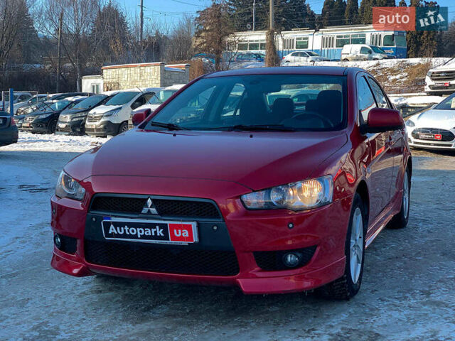Красный Мицубиси Лансер, объемом двигателя 2 л и пробегом 119 тыс. км за 7990 $, фото 1 на Automoto.ua