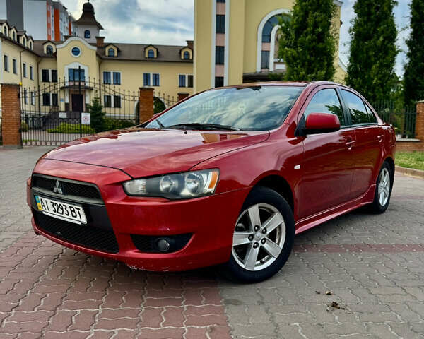 Красный Мицубиси Лансер, объемом двигателя 2 л и пробегом 365 тыс. км за 5000 $, фото 1 на Automoto.ua