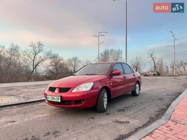 Червоний Міцубісі Lancer, об'ємом двигуна 1.6 л та пробігом 141 тис. км за 4700 $, фото 1 на Automoto.ua