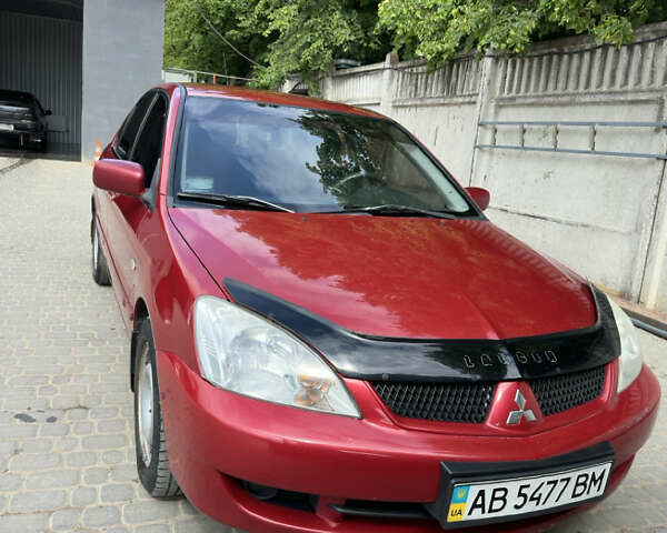 Червоний Міцубісі Lancer, об'ємом двигуна 1.6 л та пробігом 163 тис. км за 5200 $, фото 1 на Automoto.ua