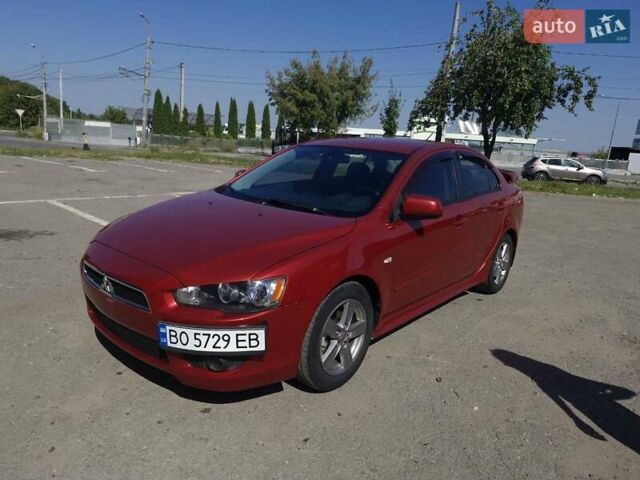 Червоний Міцубісі Lancer, об'ємом двигуна 2 л та пробігом 184 тис. км за 6200 $, фото 1 на Automoto.ua