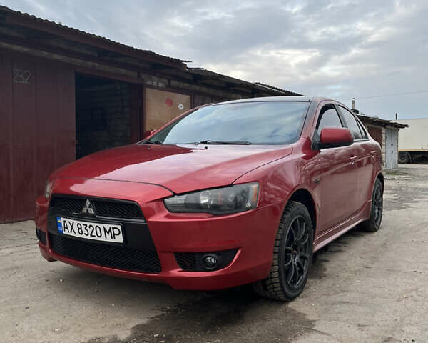 Червоний Міцубісі Lancer, об'ємом двигуна 2 л та пробігом 209 тис. км за 6900 $, фото 1 на Automoto.ua