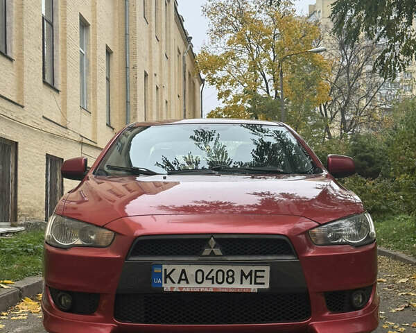Червоний Міцубісі Lancer, об'ємом двигуна 2 л та пробігом 203 тис. км за 8000 $, фото 1 на Automoto.ua