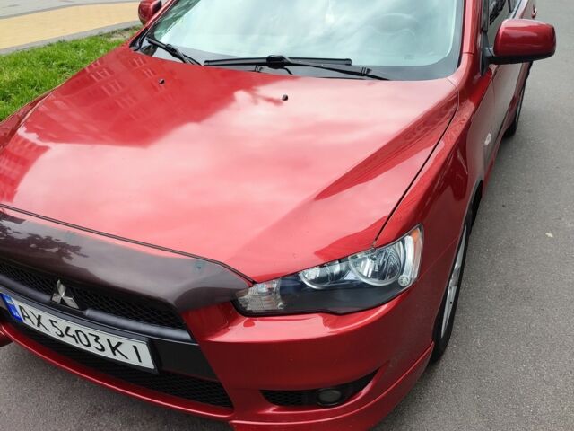 Червоний Міцубісі Lancer, об'ємом двигуна 2 л та пробігом 257 тис. км за 6900 $, фото 1 на Automoto.ua
