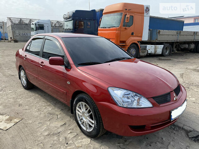 Червоний Міцубісі Lancer, об'ємом двигуна 1.6 л та пробігом 172 тис. км за 6200 $, фото 1 на Automoto.ua