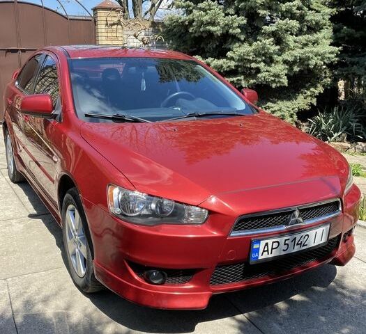 Червоний Міцубісі Lancer, об'ємом двигуна 1.5 л та пробігом 112 тис. км за 8100 $, фото 1 на Automoto.ua