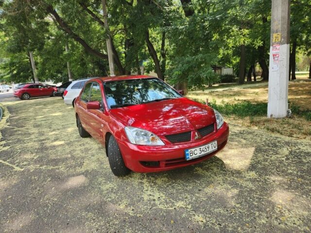 Червоний Міцубісі Lancer, об'ємом двигуна 1.6 л та пробігом 203 тис. км за 4499 $, фото 1 на Automoto.ua