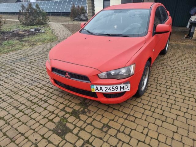 Красный Мицубиси Лансер, объемом двигателя 1.5 л и пробегом 315 тыс. км за 5699 $, фото 1 на Automoto.ua