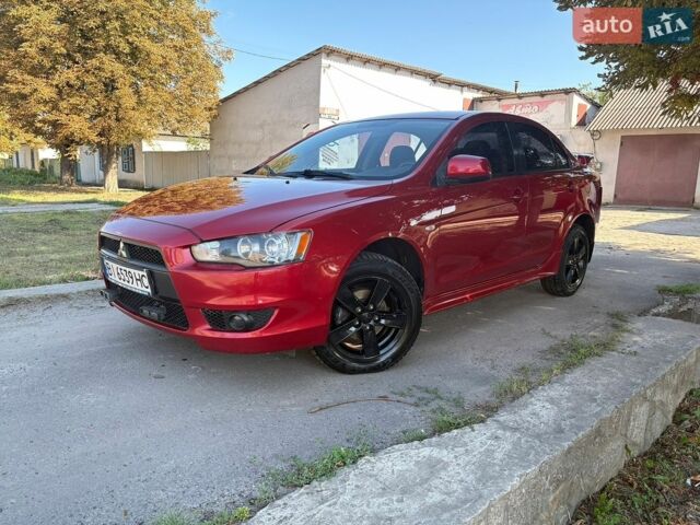 Червоний Міцубісі Lancer, об'ємом двигуна 2 л та пробігом 205 тис. км за 5600 $, фото 1 на Automoto.ua