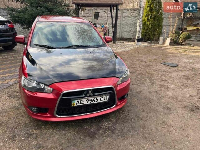 Красный Мицубиси Лансер, объемом двигателя 2 л и пробегом 340 тыс. км за 7000 $, фото 1 на Automoto.ua