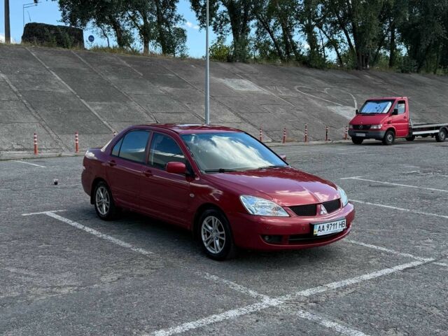 Червоний Міцубісі Lancer, об'ємом двигуна 1.6 л та пробігом 296 тис. км за 3702 $, фото 1 на Automoto.ua